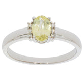 Elegant Green Peridot ring in 14K white gold with diamond accents, perfect for adding sophistication to any jewelry collection.